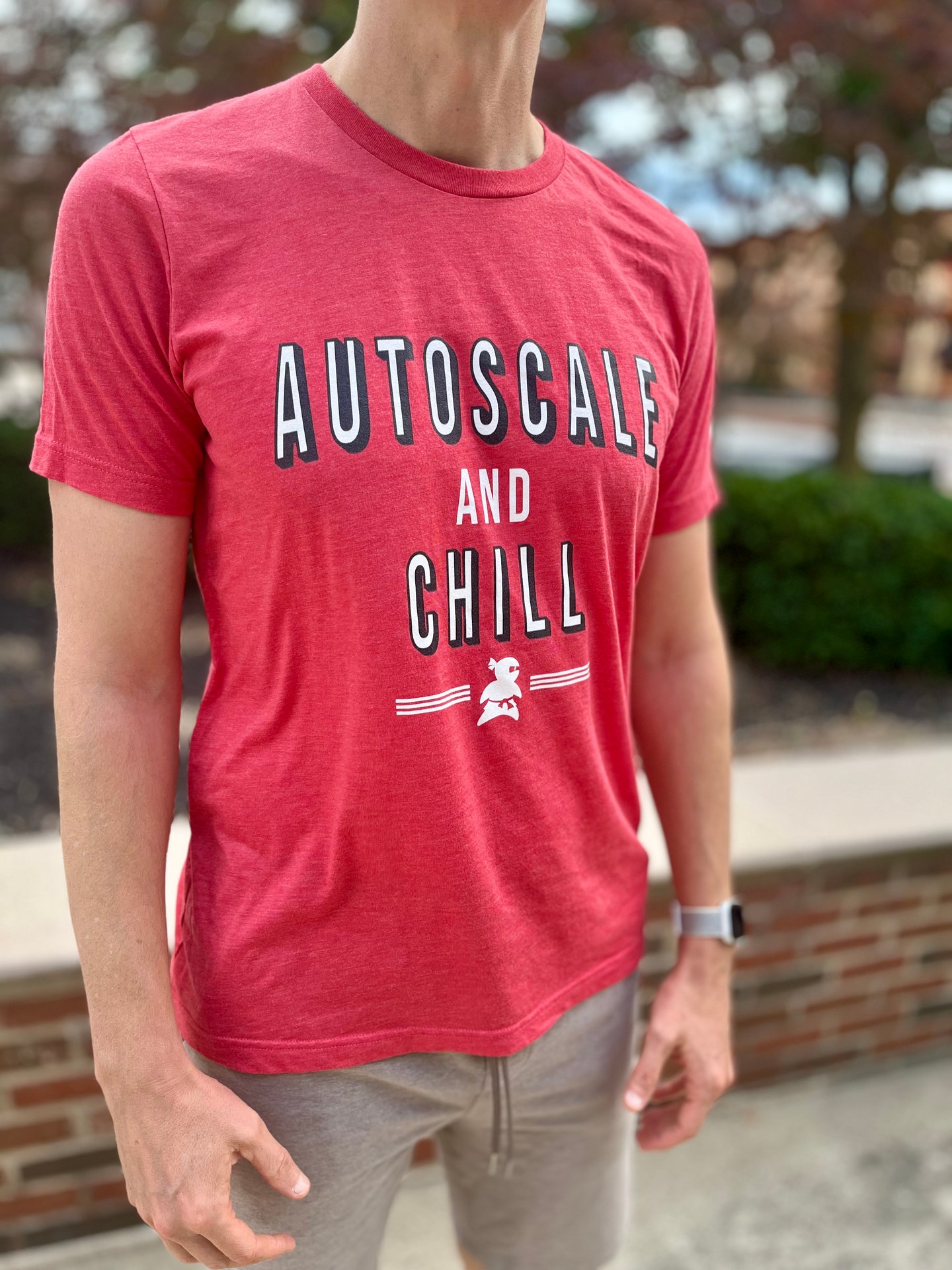 A picture of Adam wearing the ‘autoscale and chill’ t-shirt as an example